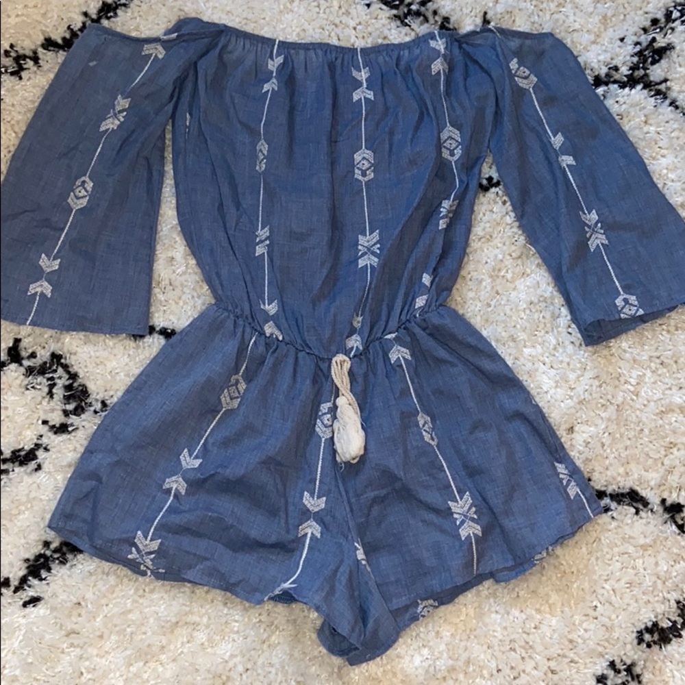 Denim romper with white embroidery